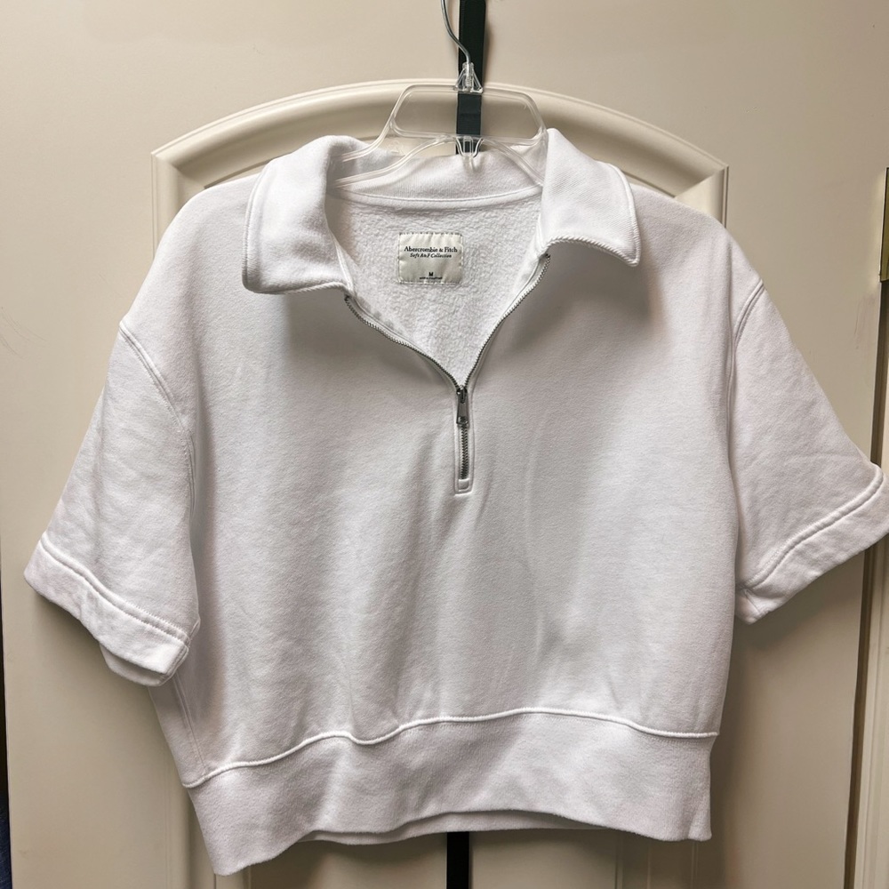 Abercrombie & Fitch women’s short-sleeve zip polo top.